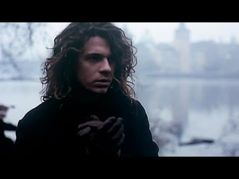 Never Tear Us Apart (Official Music Video)